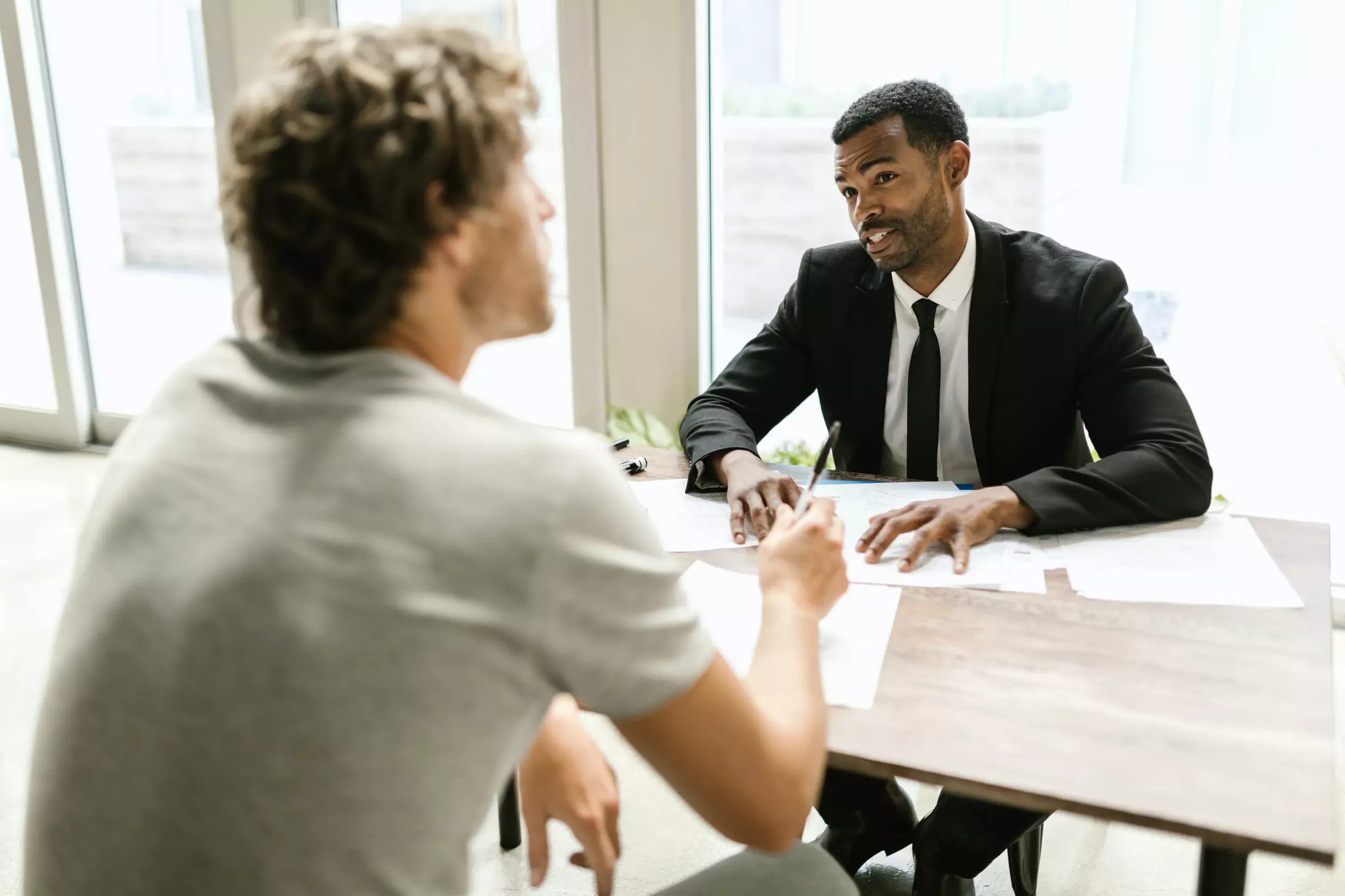 An attorney speaking with his client.